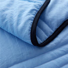 Cooling summer blanket with airy fabric construction