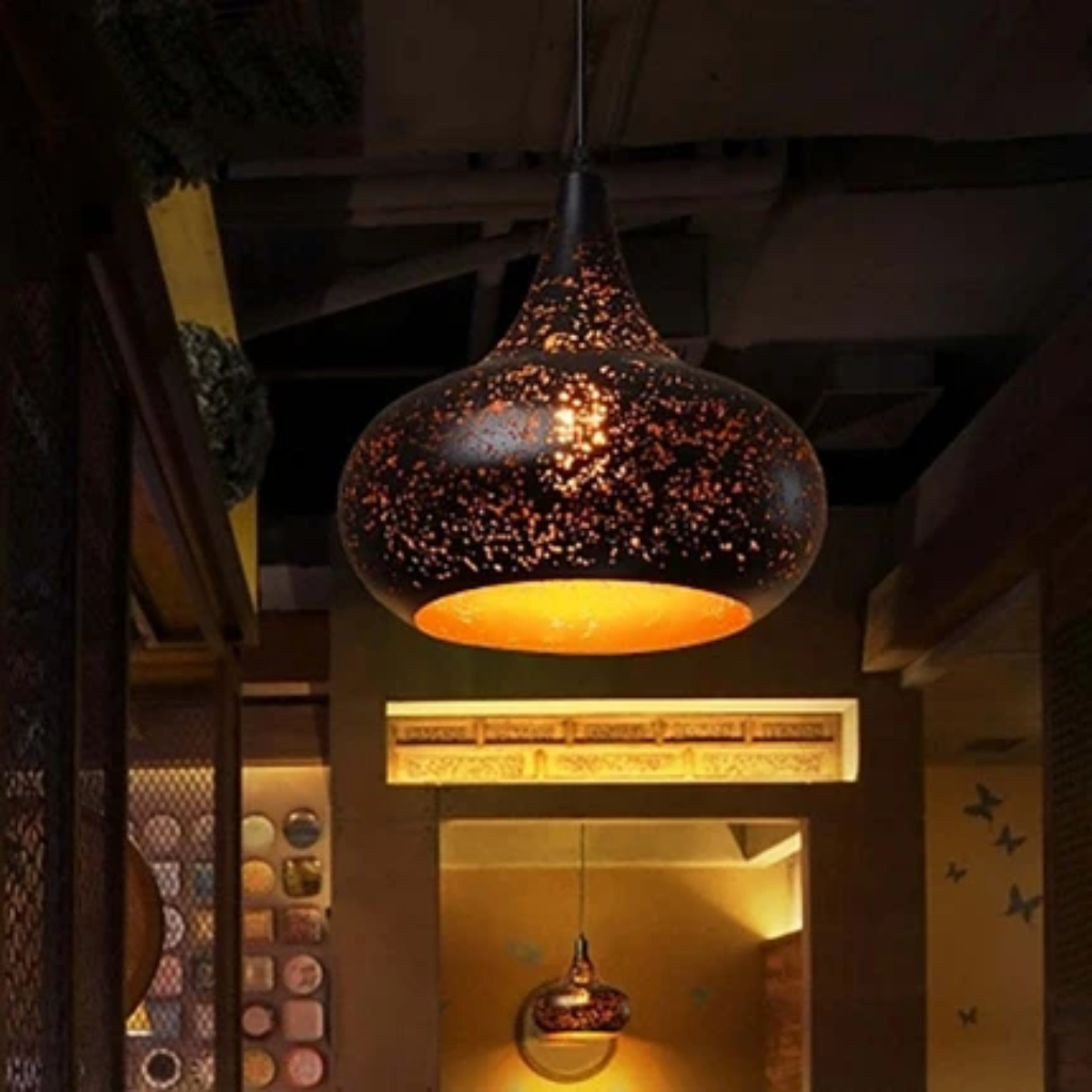 Pendant light fixture with perforated iron shade
