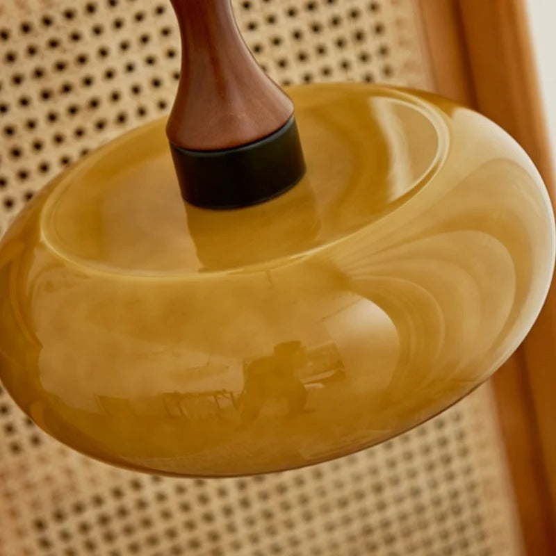Pendant light with adjustable cord and glass shade