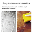 Cutting board with double sided titanium surface