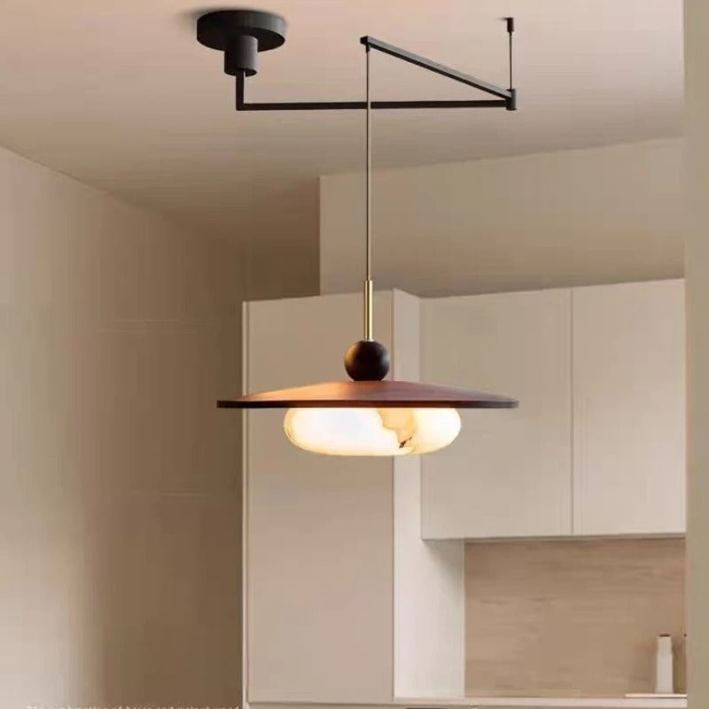 Pendant light with adjustable swing arm
