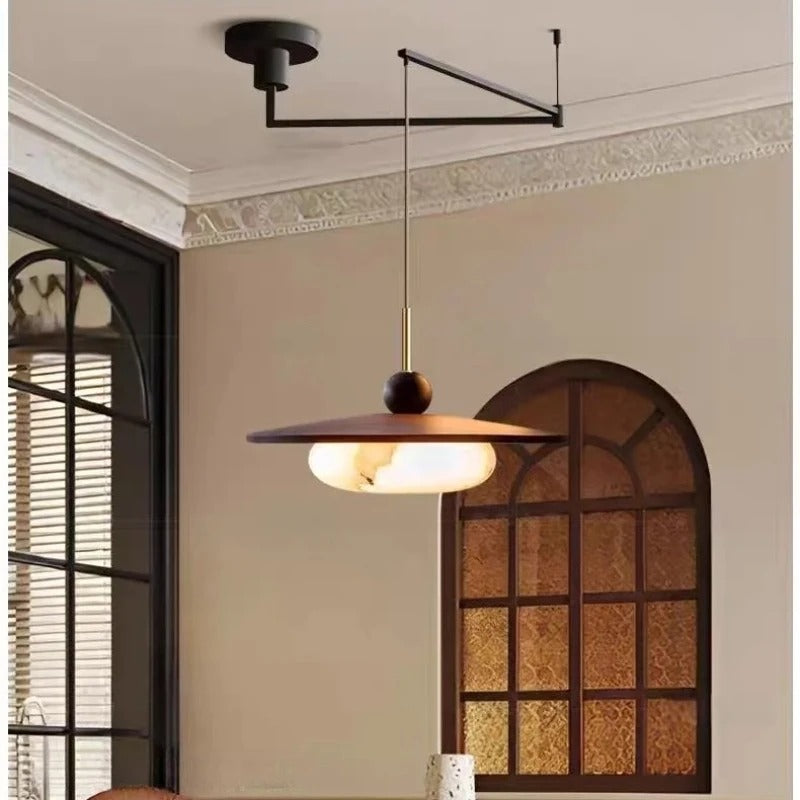 Pendant light with adjustable swing arm