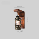 Wall sconce light with rustic lantern design