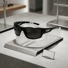 Military sunglasses with polarised lenses and glare reduction - black
