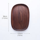 Wooden serving tray with irregular decorative shape